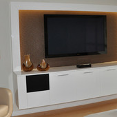 Entertainment Center, built-in: hand rubbed, high gloss lacquer with upholstered