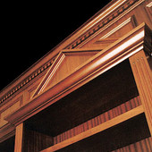Bookcase (detail), built-in: stained mahogany and ribbon stripe mahogany.