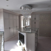 Dressing Room, built-in: marble, glass, plaster figures with antiqued silver lea