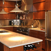 Kitchen, built-in: granite, stained ribbon stripe mahogany and mahogany.