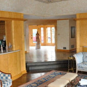Paneled Room with Display Cabinets, built-in: travertine marble, stained birdsey