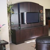 Entertainment Center: Glass, ribbon stripe mahogany